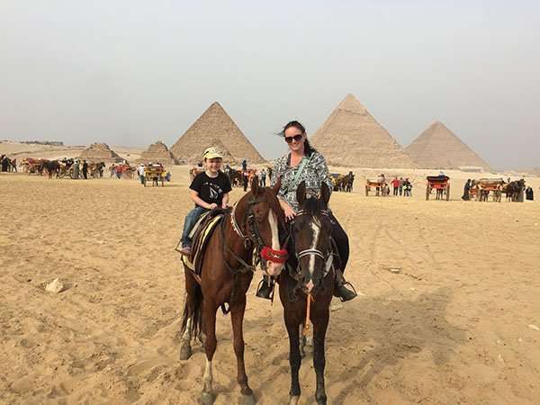 Lindsay and Markus on horseback at the pyramids